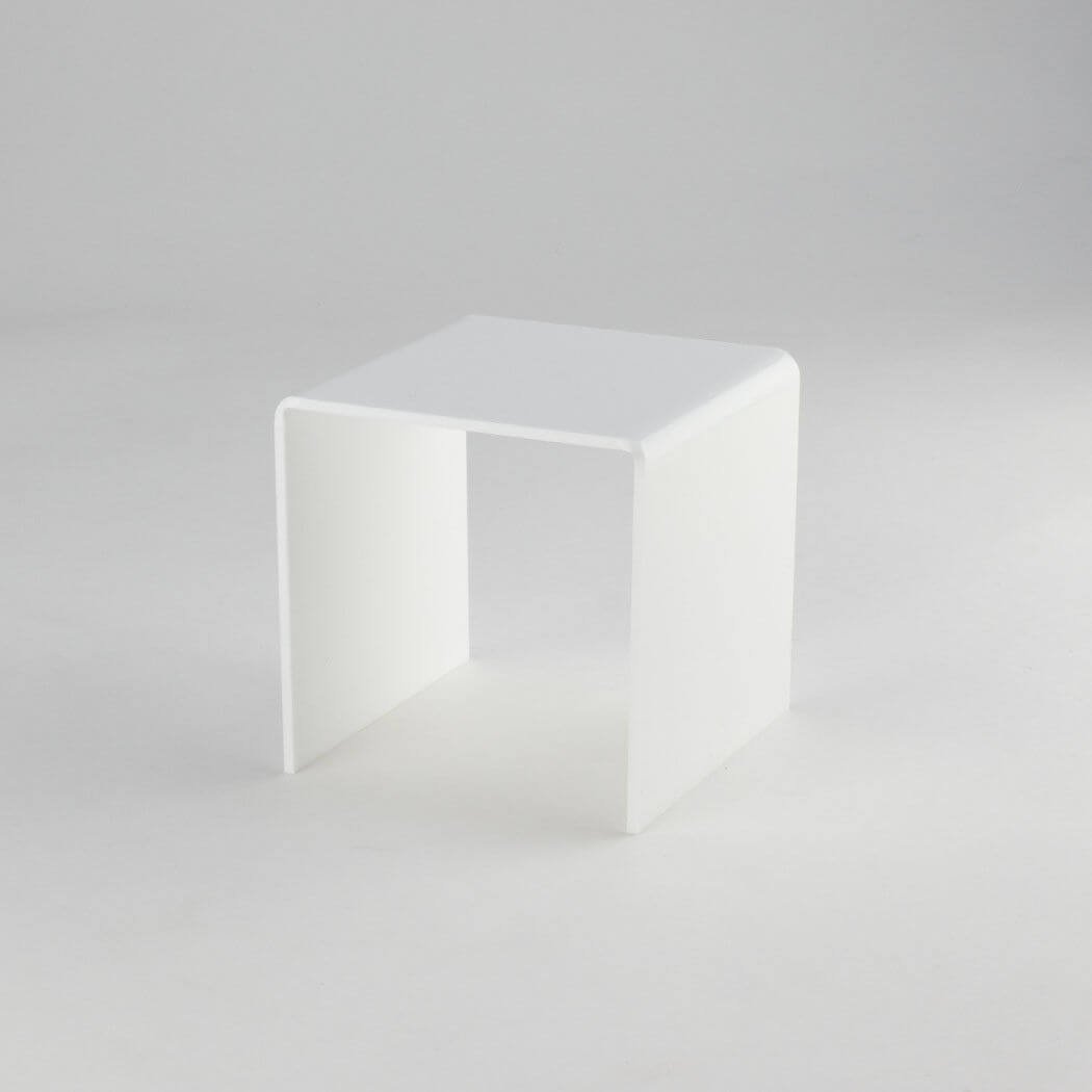 white acrylic riser stand